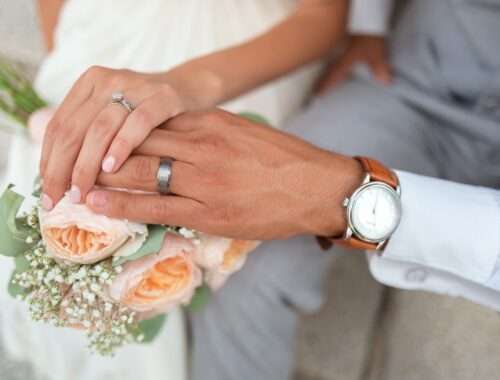 man and woman holding hands